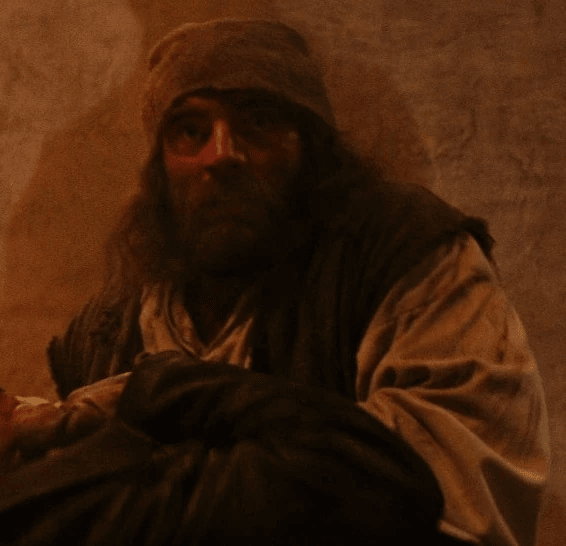 Pat Roach actuando como vagabundo en la película Indiana Jones y la última cruzada (1989)