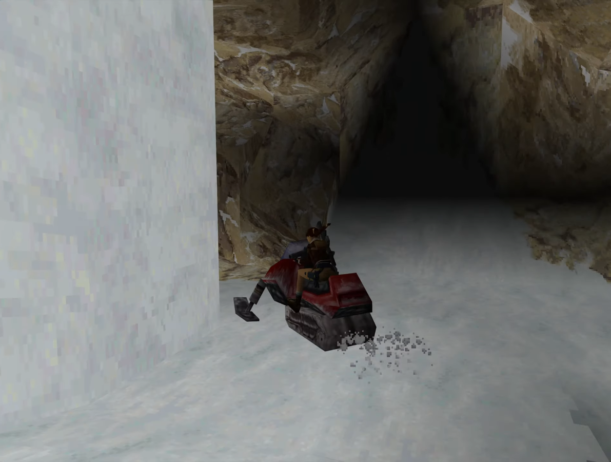 Lara Croft manejando una moto de nieve en el nivel de las laderas tibetanas de Tomb Raider II (1997) Lara Croft manejando una moto de nieve en el nivel de las laderas tibetanas de Tomb Raider II (1997)