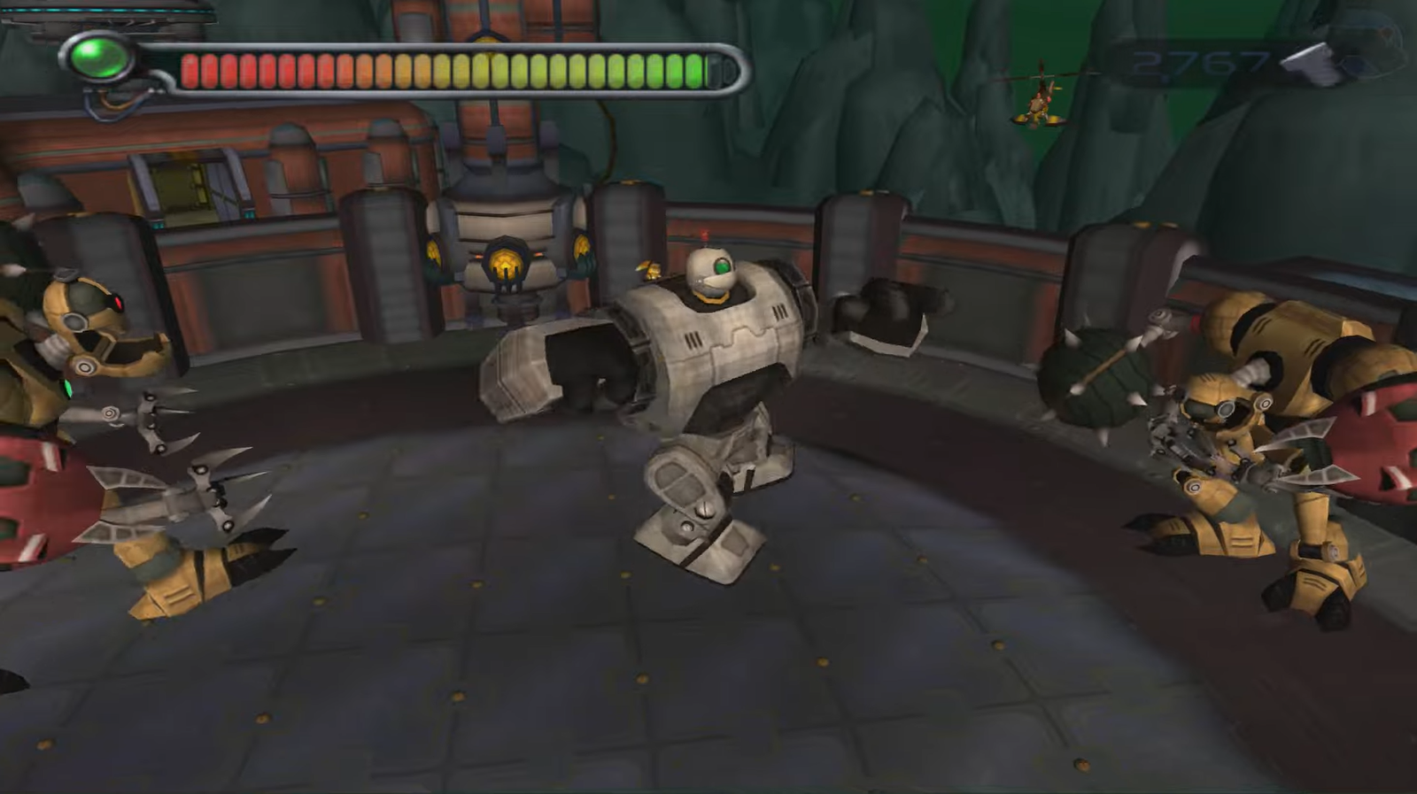 Clank gigante en una misión de combate en el planeta Quartu en Ratchet & Clank (2002) Clank gigante en una misión de combate en el planeta Quartu en Ratchet & Clank (2002)